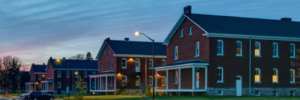 Wide view of Fort Des Moines buildings at twilight,